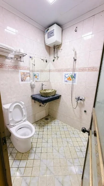 豪华双人间（2 名成人 + 1 名儿童） — Khuyên Ngọc Hotel